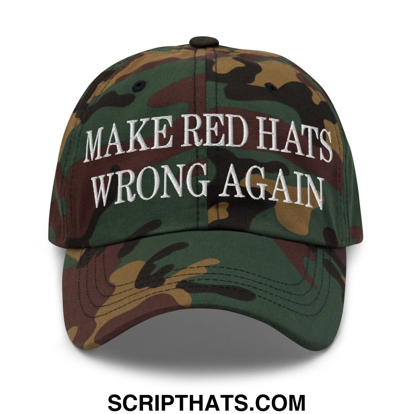 A camouflage unstructured dad hat with white embroidered text make red hats wrong again on the front panel