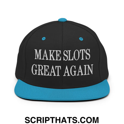 Black snapback cap with teal brim and button featuring white embroidered make slots great again text