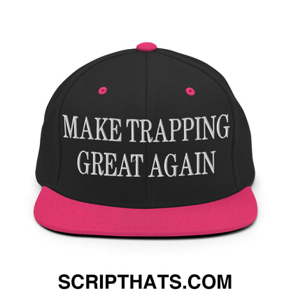 Black snapback cap with pink brim and button featuring white embroidered make trapping great again text