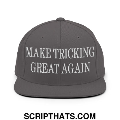 Gray snapback hat with white embroidered make tricking great again text on flat bill brim for casual wear