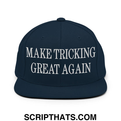 Navy blue snapback hat with white embroidered make tricking great again text and flat bill brim design