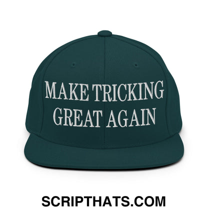 Dark green snapback hat with flat bill brim and white embroidered make tricking great again text
