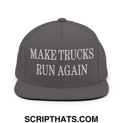 Gray snapback hat with white embroidered white text make trucks run again and flat bill brim design