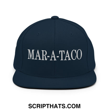 Navy blue snapback hat with white embroidered mar-a-taco lettering and flat bill brim for casual wear