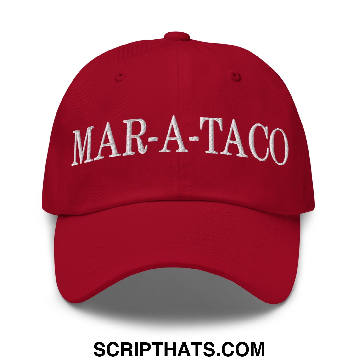 Red unstructured dad hat with white embroidered mar-a-taco text on the front made of soft cotton material