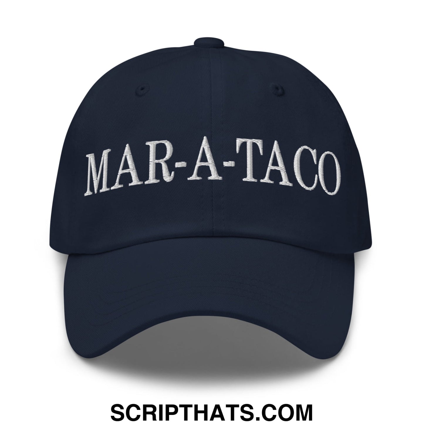 Navy blue unstructured dad hat with white embroidered mar-a-taco text across the front