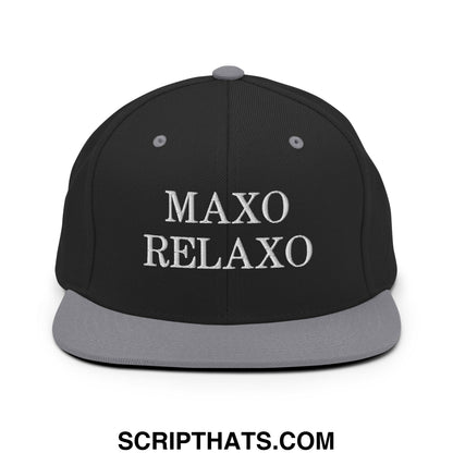 Black snapback cap with gray flat bill brim and white embroidered maxo relaxo text on the front panel