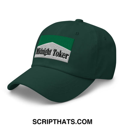 Dark green embroidered unstructured dad hat with rectangular silver and green patch reading midnight toker