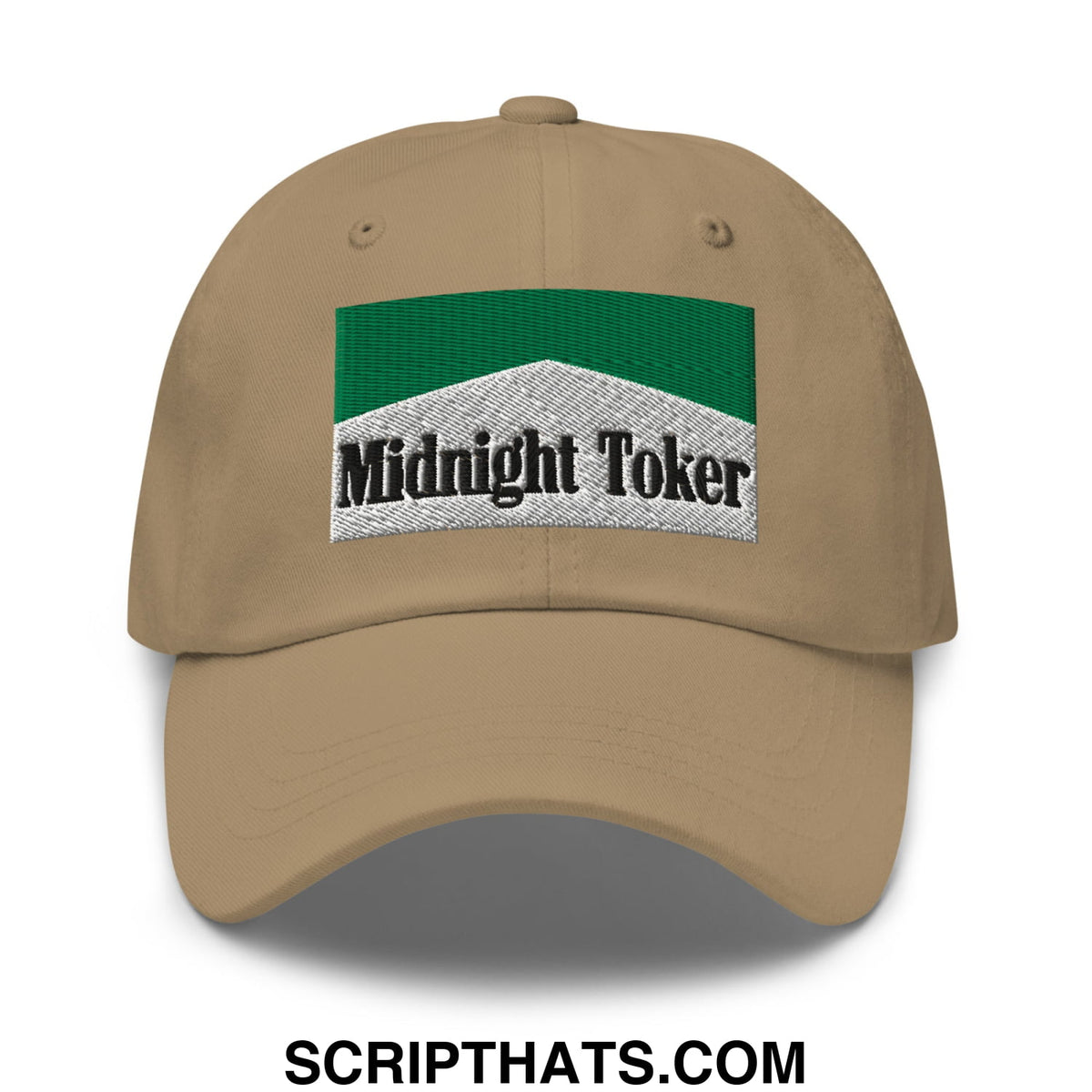 Tan unstructured dad hat with midnight toker black lettering and green silver embroidered patch detail