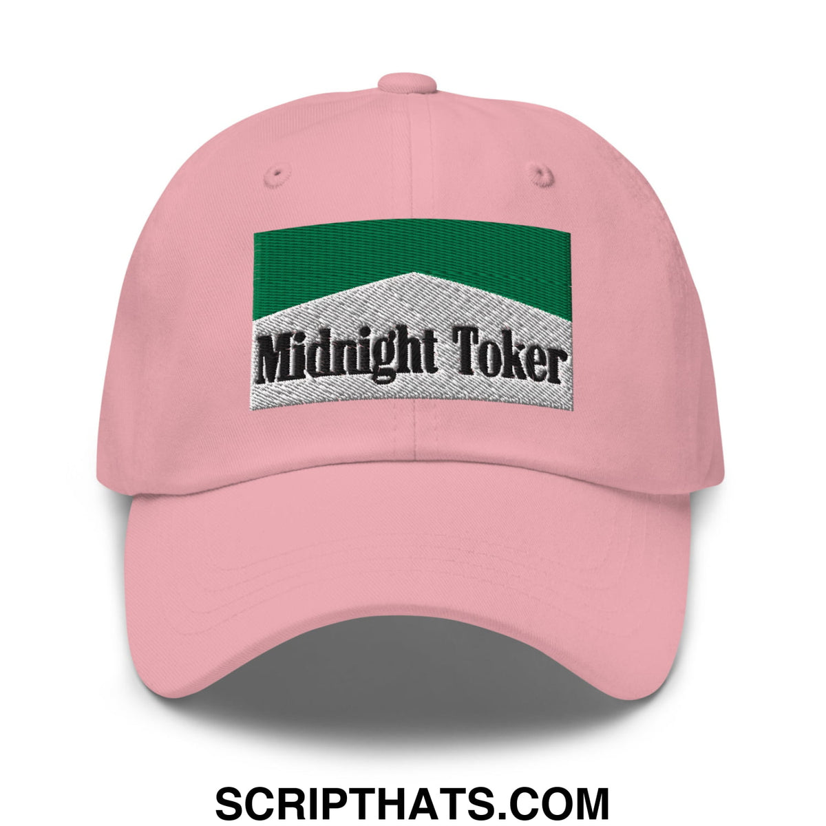 Pink unstructured dad hat featuring a green and silver embroidered midnight toker patch for casual wear