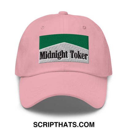 Pink unstructured dad hat featuring a green and silver embroidered midnight toker patch for casual wear