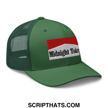 Green mesh trucker hat with a red and white embroidered midnight toker patch on the front panel