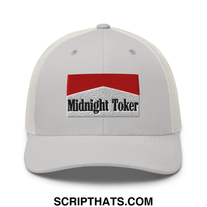 White mesh trucker hat with red and silver embroidered midnight toker patch for casual wear