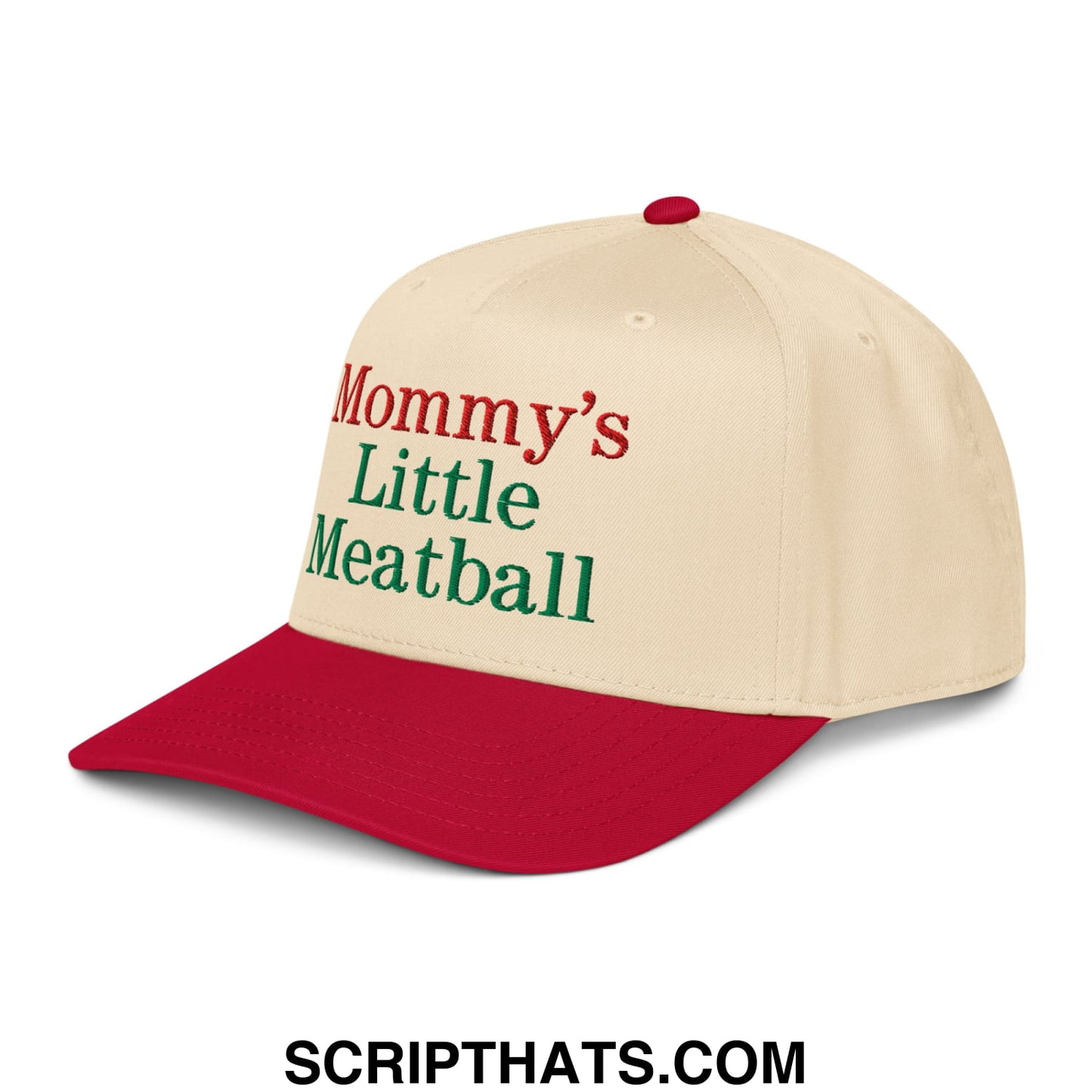 Cream-colored baseball cap with red brim and button featuring embroidered mommy’s little meatball text in red and green