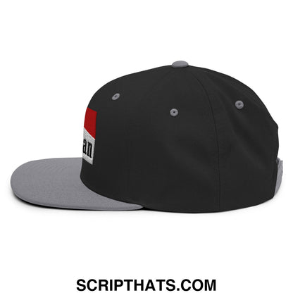 Black snapback cap with gray flat bill brim and red and white mulligan cigarette embroidered logo patch on side