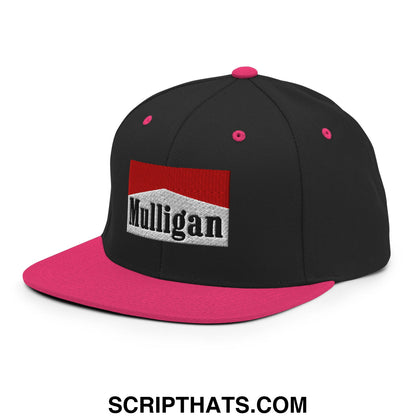 Black snapback cap with vibrant pink flat bill and button featuring embroidered mulligan logo on red and white patch