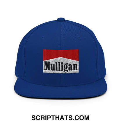 Royal blue snapback hat with a flat bill featuring a red and white embroidered mulligan cigarette logo