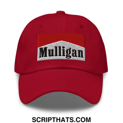 Red embroidered unstructured golf dad hat featuring mulligan logo on silver textured background with red and white stripes