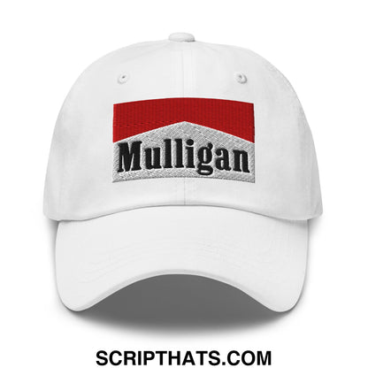 White unstructured golf dad hat featuring a red and gray embroidered mulligan logo with black lettering