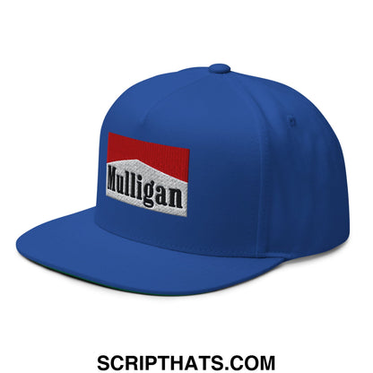 Blue snapback cap with red and white embroidered mulligan logo patch featuring a flat brim and five panel design