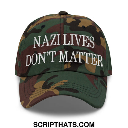 A camouflage-patterned unstructured dad hat with white embroidered text reading nazi lives don’t matter