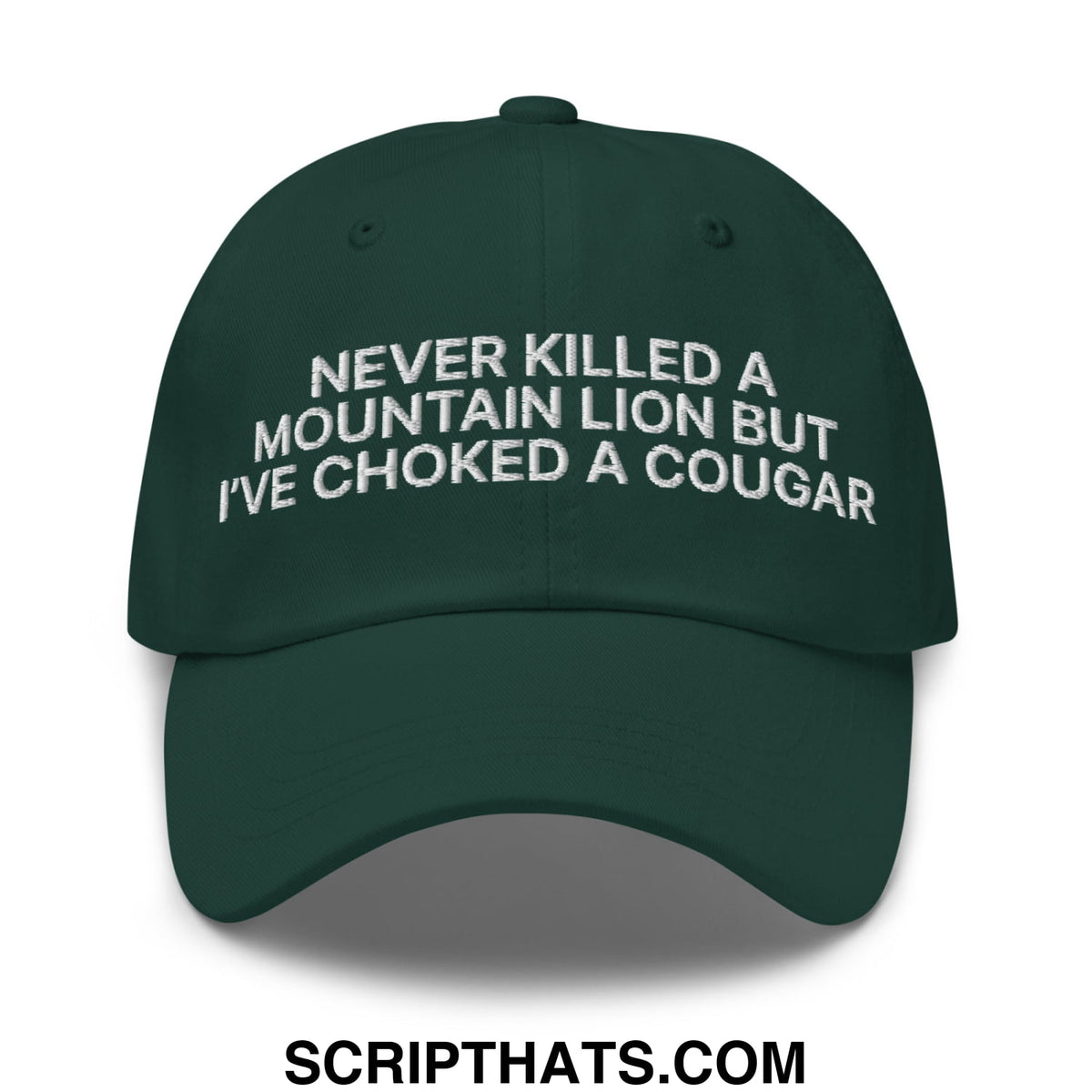 Dark green unstructured dad hat featuring white embroidered text never killed a mountain lion but ive choked a cougar