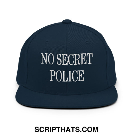 Dark navy blue snapback hat with white embroidered no secret police text and flat bill brim design