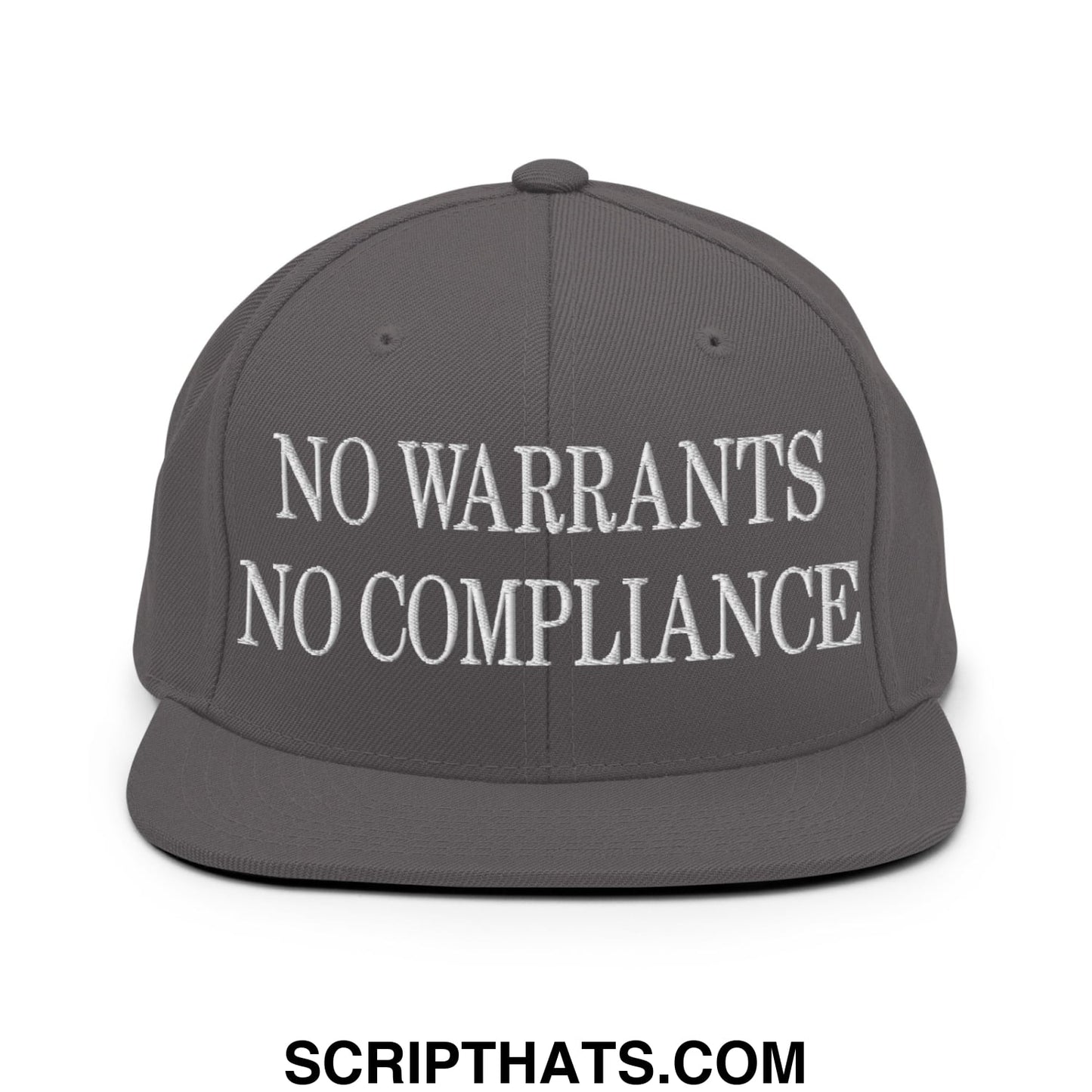 Dark gray snapback hat with white embroidered no warrants no compliance text and flat bill brim design