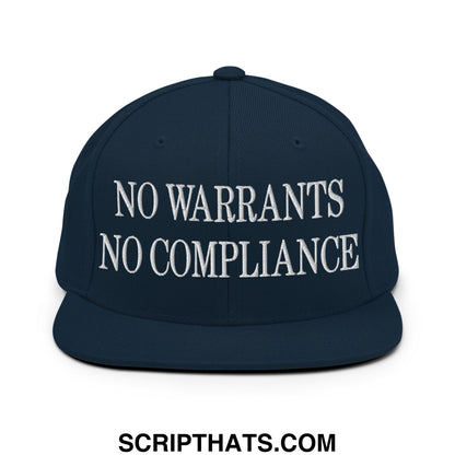 Dark navy snapback hat with white embroidered no warrants no compliance text and flat bill brim design