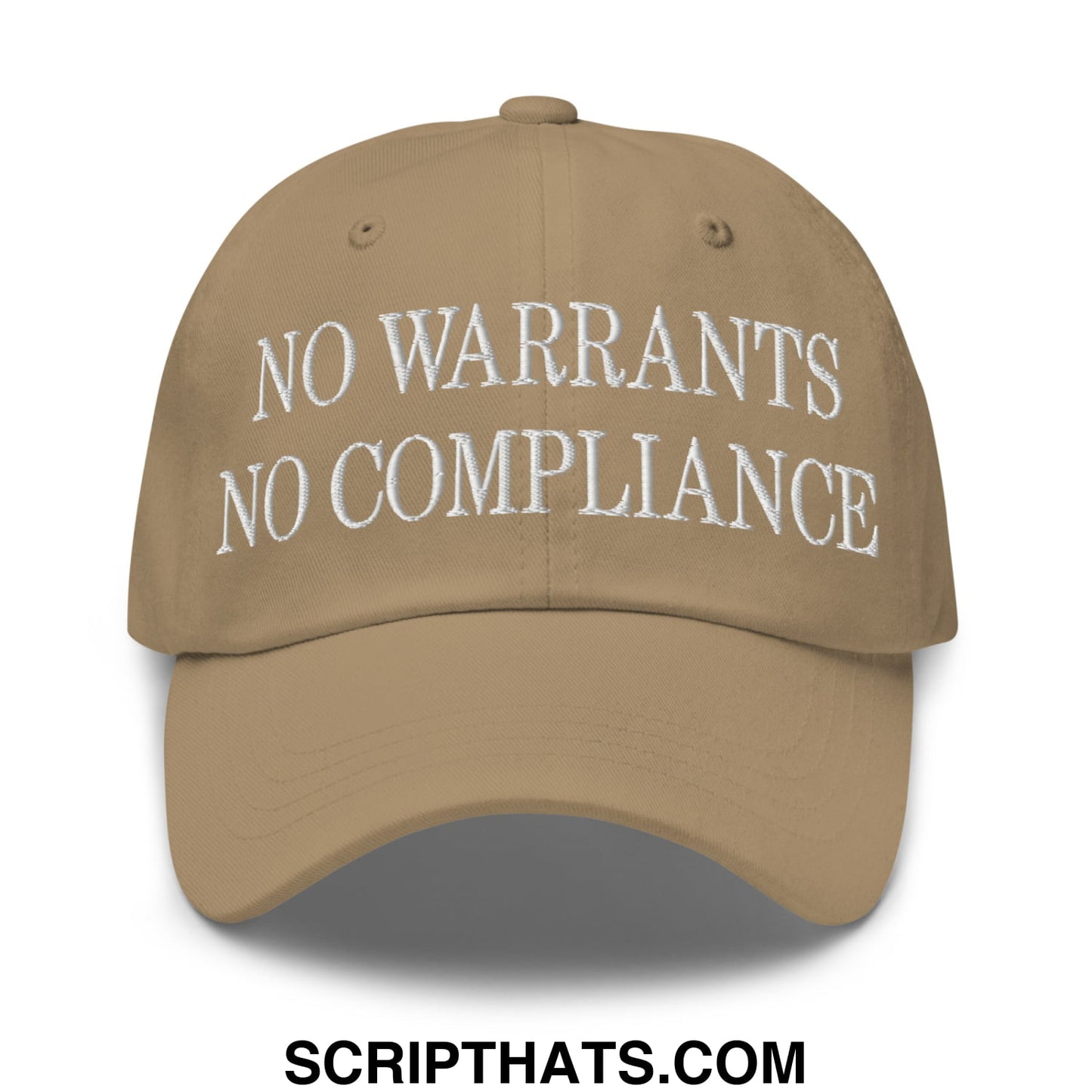 Tan unstructured dad hat with white embroidered no warrants no compliance text for casual wear