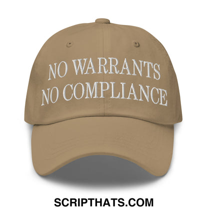 Tan unstructured dad hat with white embroidered no warrants no compliance text for casual wear