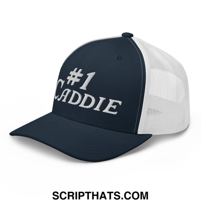Navy blue and white mesh trucker hat with number 1 caddie embroidered in silver thread on front panel