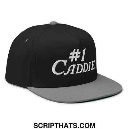 Black and gray 5 panel golf snapback hat with white embroidered number 1 caddie text and flat brim bill