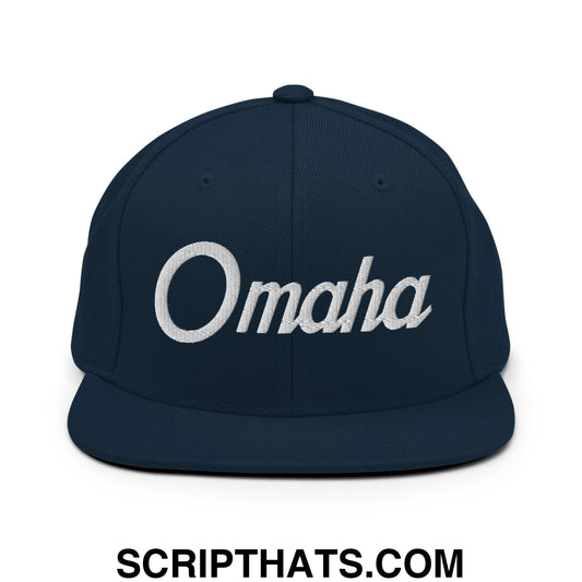 Navy blue snapback cap with white embroidered Omaha vintage sports script and flat bill brim design
