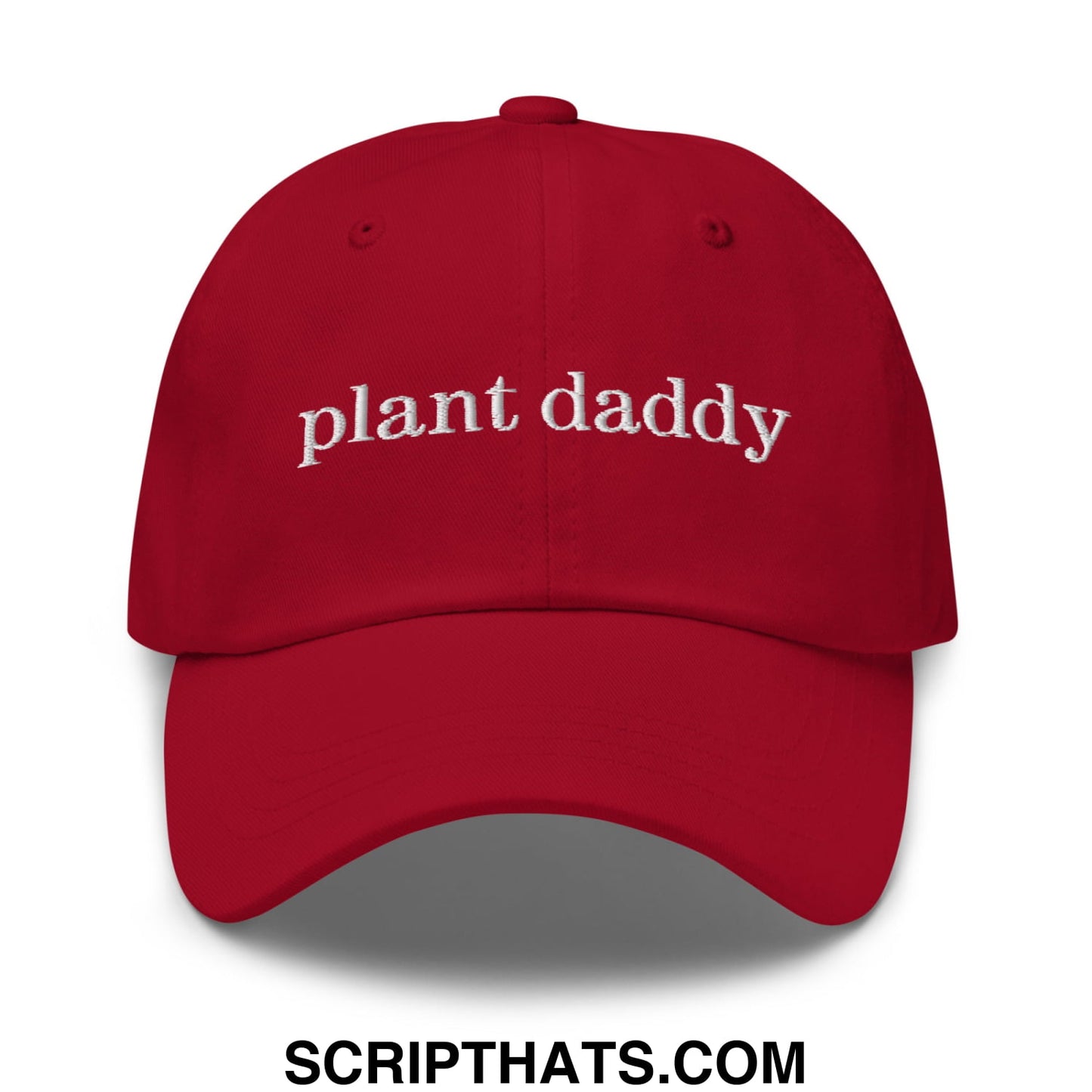 Red unstructured dad hat with white embroidered plant daddy text perfect for casual wear