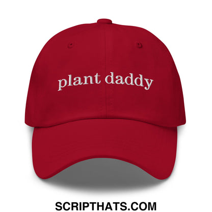 Red unstructured dad hat with white embroidered plant daddy text perfect for casual wear