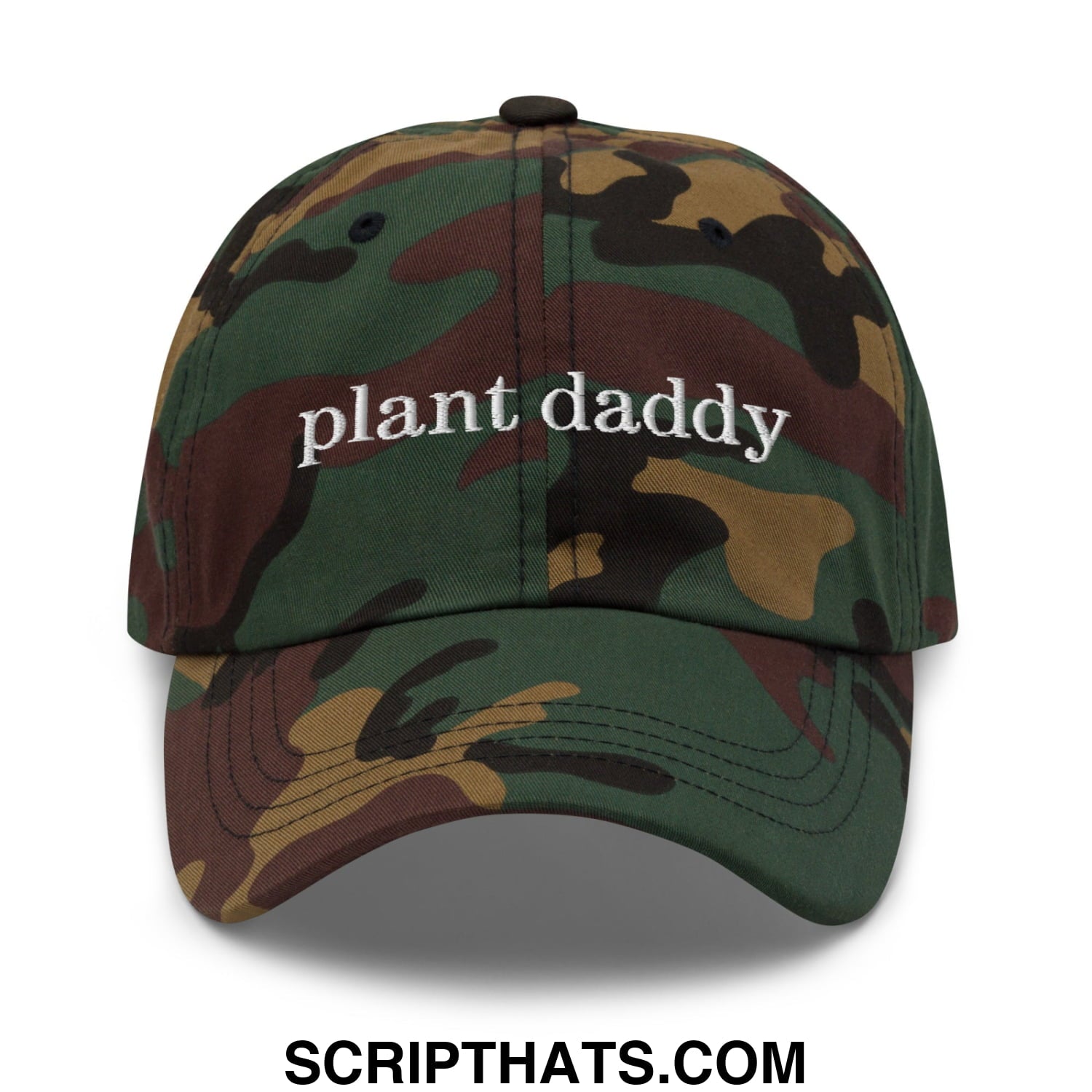 A camouflage-patterned unstructured dad hat with plant daddy embroidered in white thread on the front