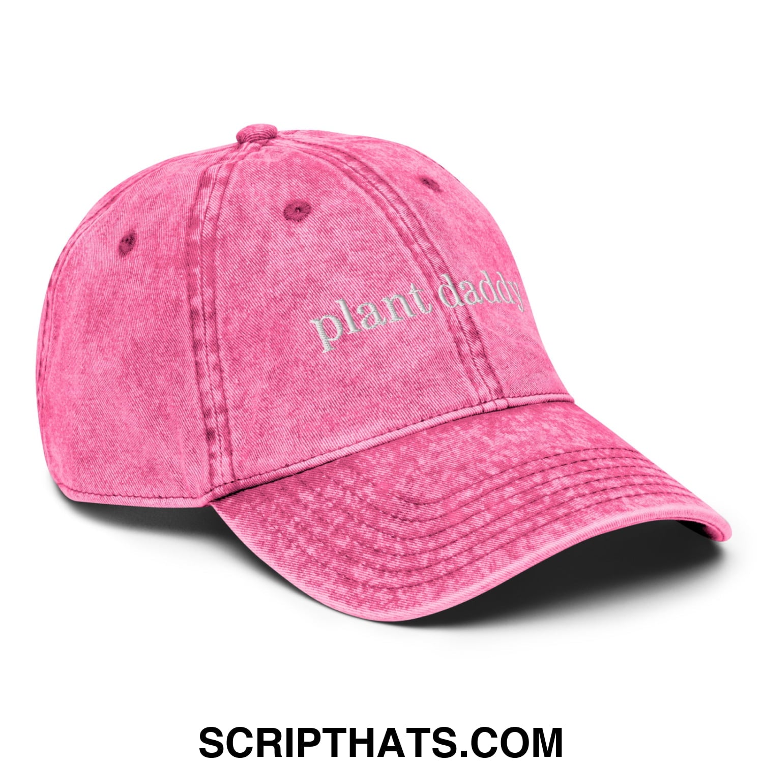 Faded pink denim dad hat featuring plant daddy embroidered in white thread on the front