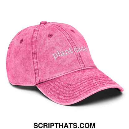 Faded pink denim dad hat featuring plant daddy embroidered in white thread on the front