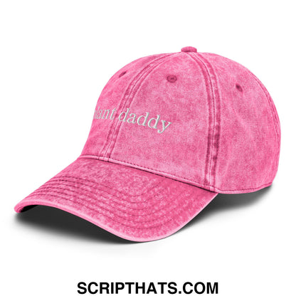 A faded pink denim dad hat with plant daddy embroidered in white script on the front unstructured design