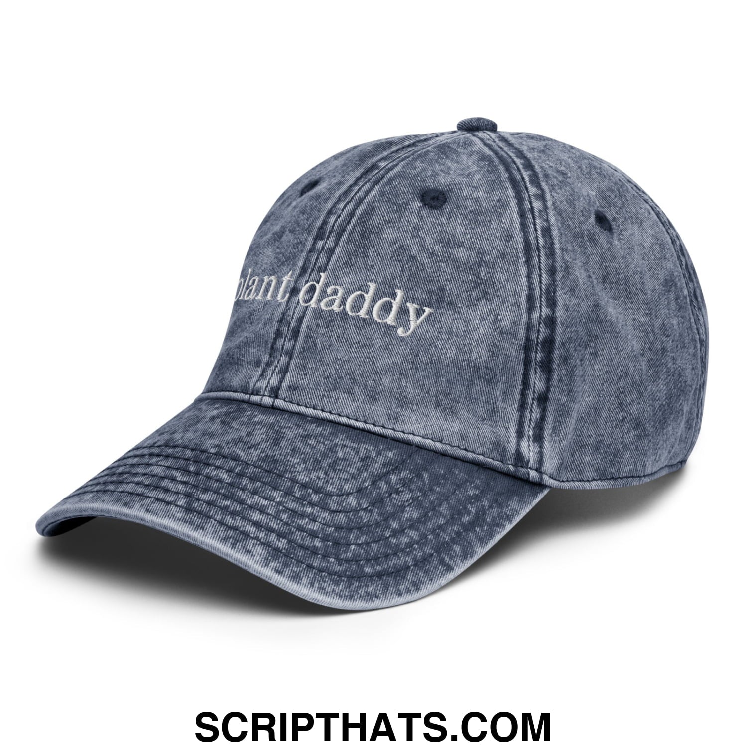 A faded blue denim dad hat with plant daddy embroidered in white script on the front unstructured design