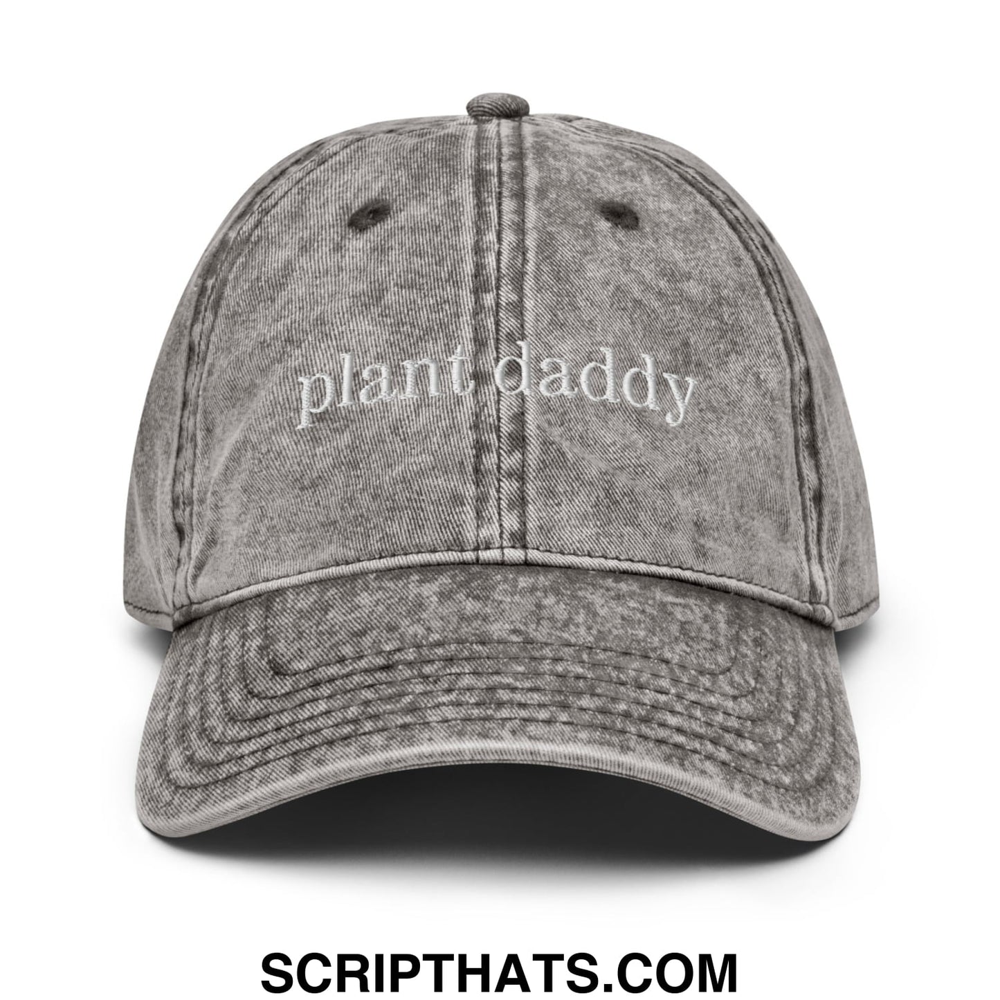 A faded gray unstructured denim dad hat with plant daddy embroidered in white script on the front