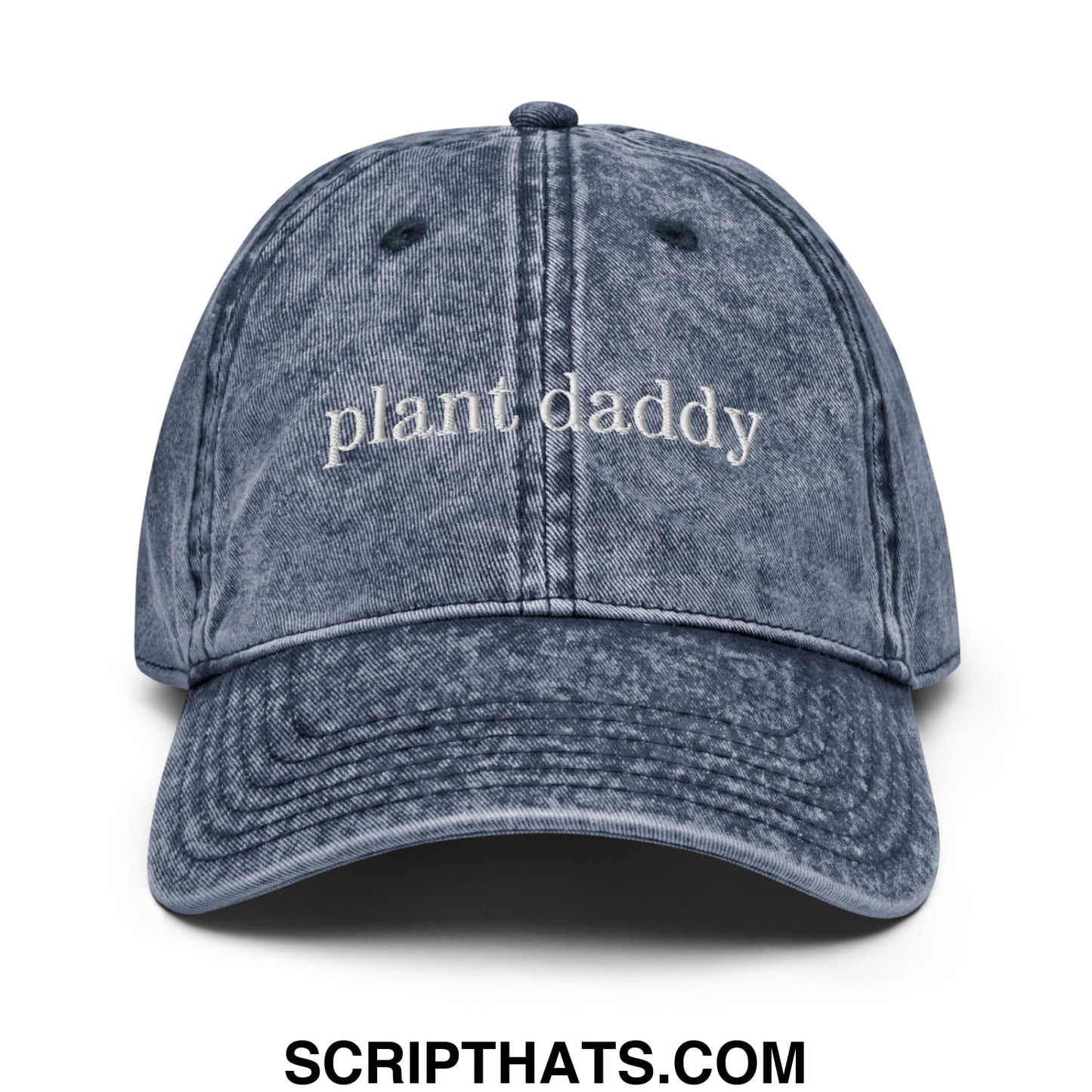Faded blue denim unstructured dad hat with plant daddy embroidered in white script across the front