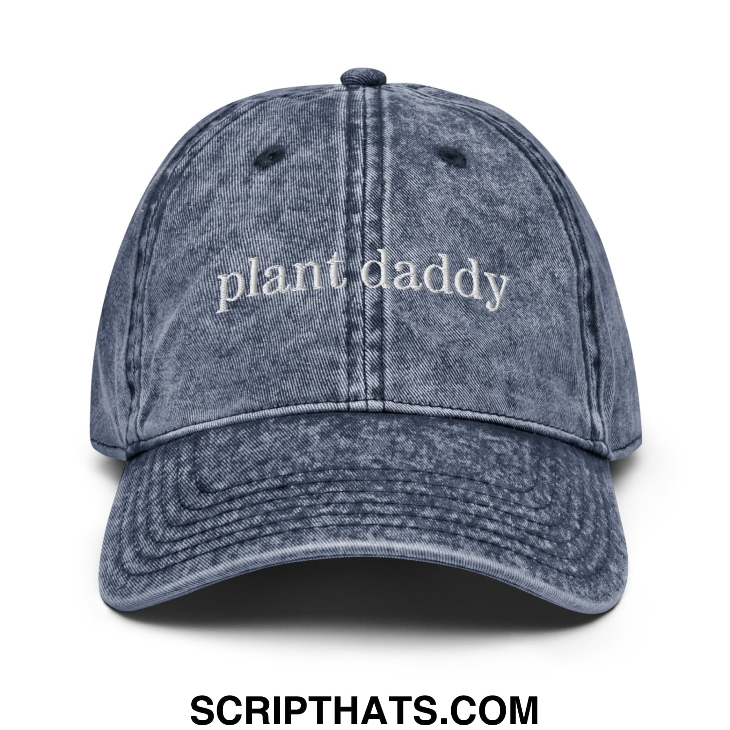 Faded blue denim unstructured dad hat with plant daddy embroidered in white script across the front