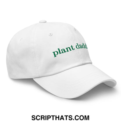White unstructured dad hat with green embroidered plant dad text perfect for plant dads
