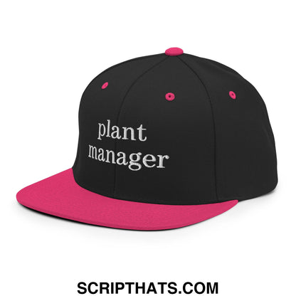 Black and pink snapback hat with white embroidered plant manager text and flat bill brim design