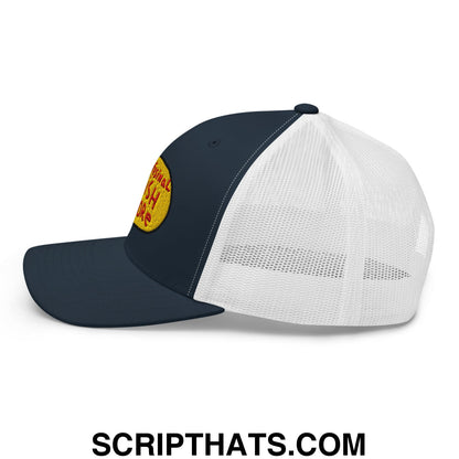 Navy blue and white mesh trucker hat with a yellow embroidered patch for professional fish store use