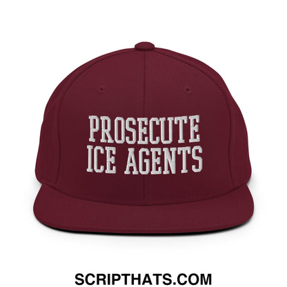Maroon flat bill snapback hat with white embroidered text prosecute ice agents in bold lettering