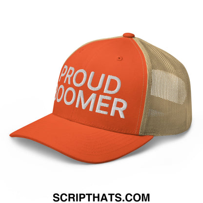 Orange and beige mesh trucker hat with proud boomer embroidered in white on the front panel