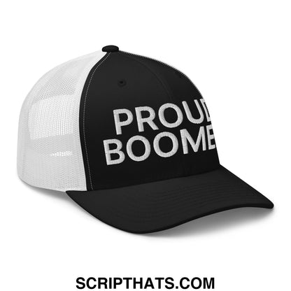 Black and white mesh trucker hat with proud boomer embroidered in bold white textured lettering on the front panel